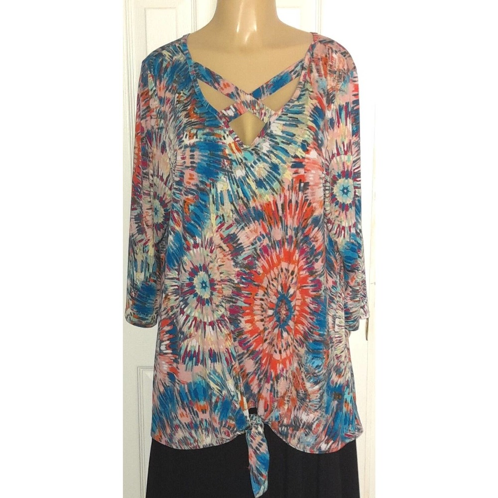 Lilypad Multicolor Tunic crisscross detail on neckline. Knot tie on hem